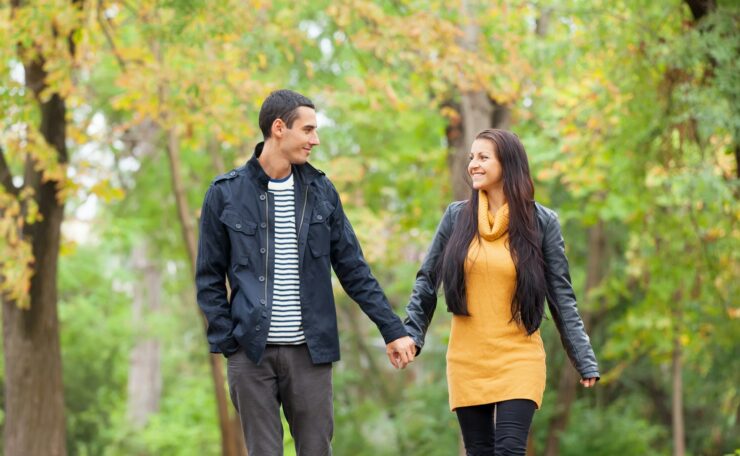 Ten couple at the park in autumn time
